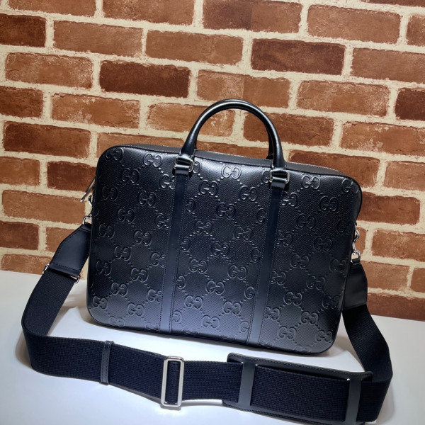 G*u*i gg embossed briefcase