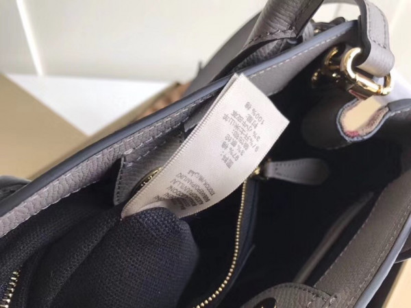 B**rry the small banner in leather and house check