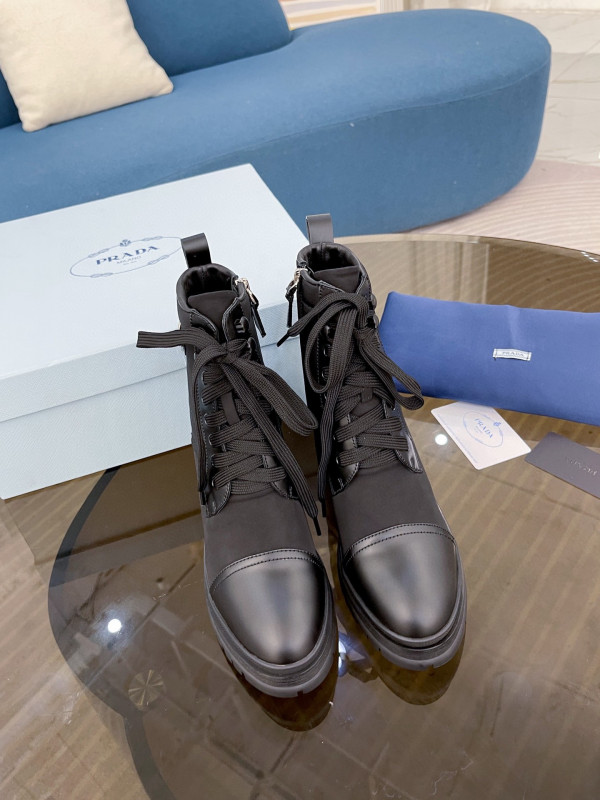 Pra*a brushed leather and nylon laced booties