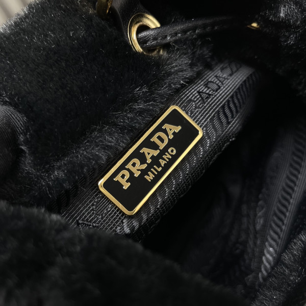Pra*a shearling bucket bag