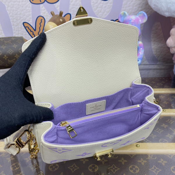 l0*is V*t0n pochette metis east west