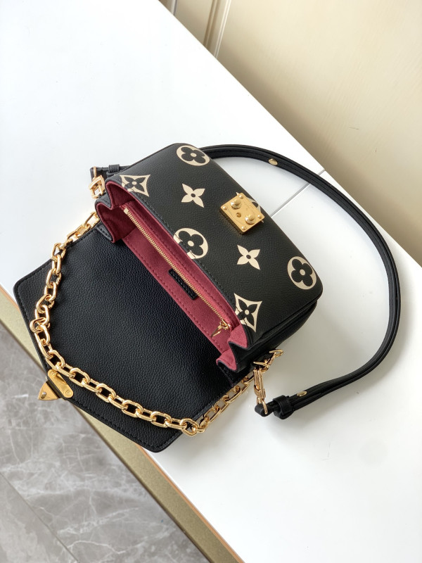 l0*is V*t0n pochette metis east west