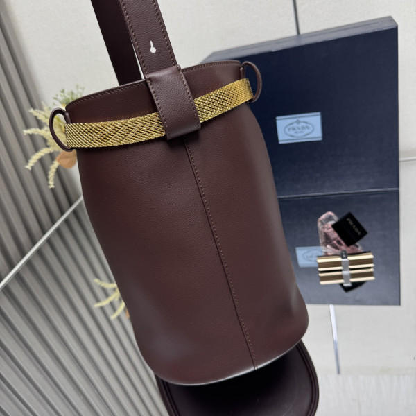 Pra*a buckle leather bucket bag with jeweled belt