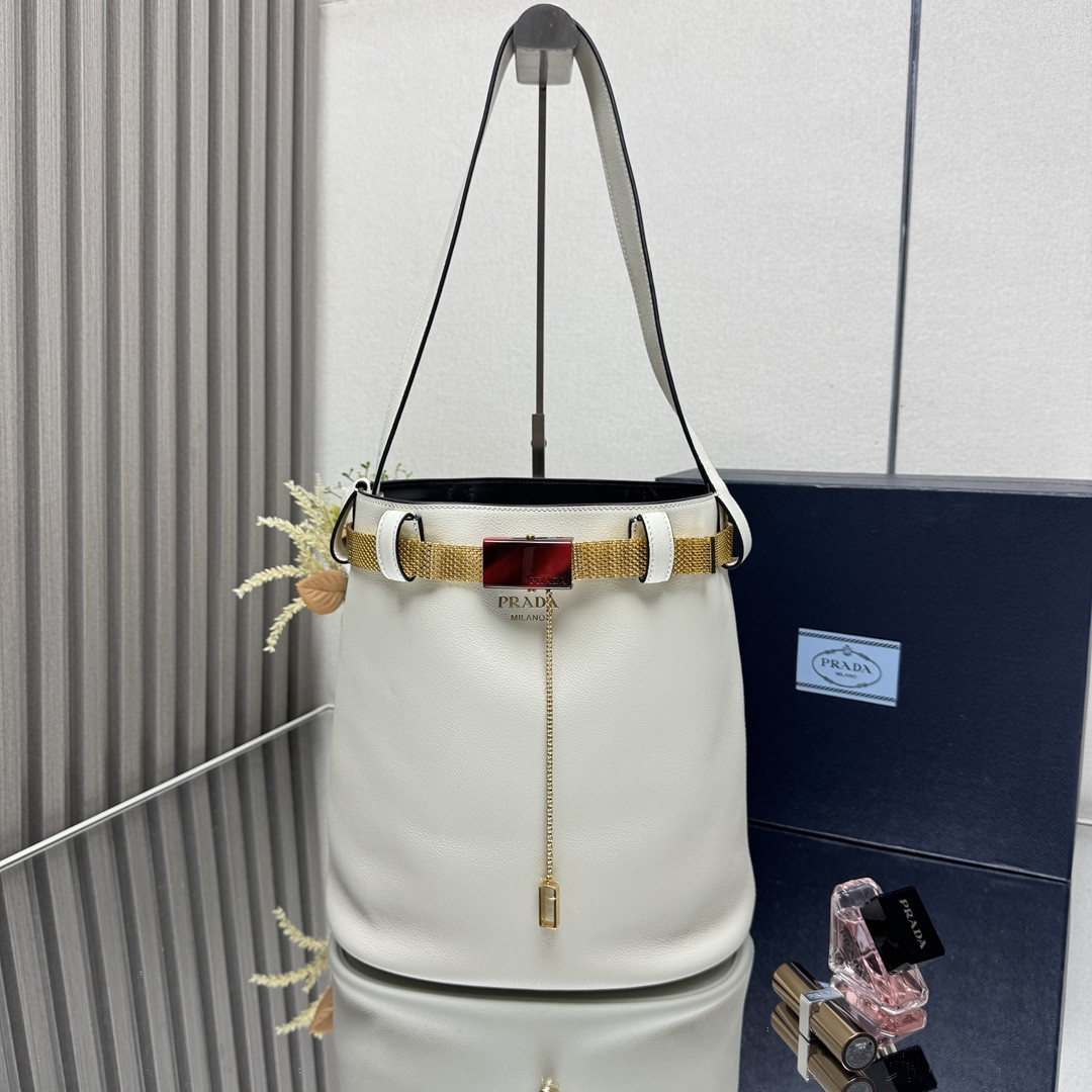 Pra*a buckle leather bucket bag with jeweled belt